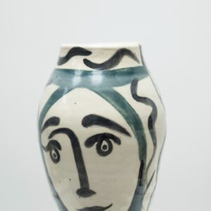 Stunning large serene vase with two face images on either side